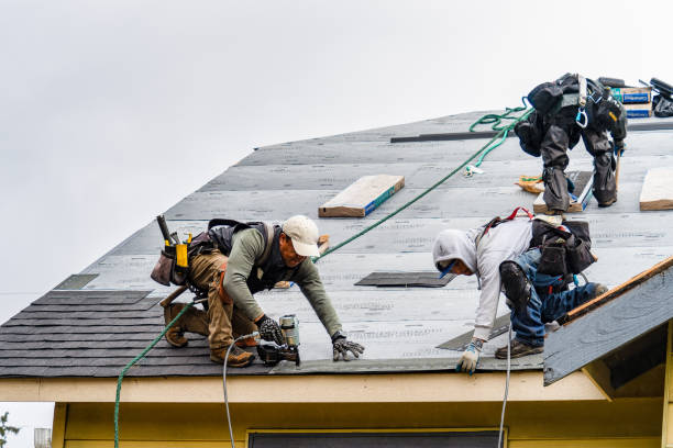 Professional Gutter Installation technician working in Marion, MA